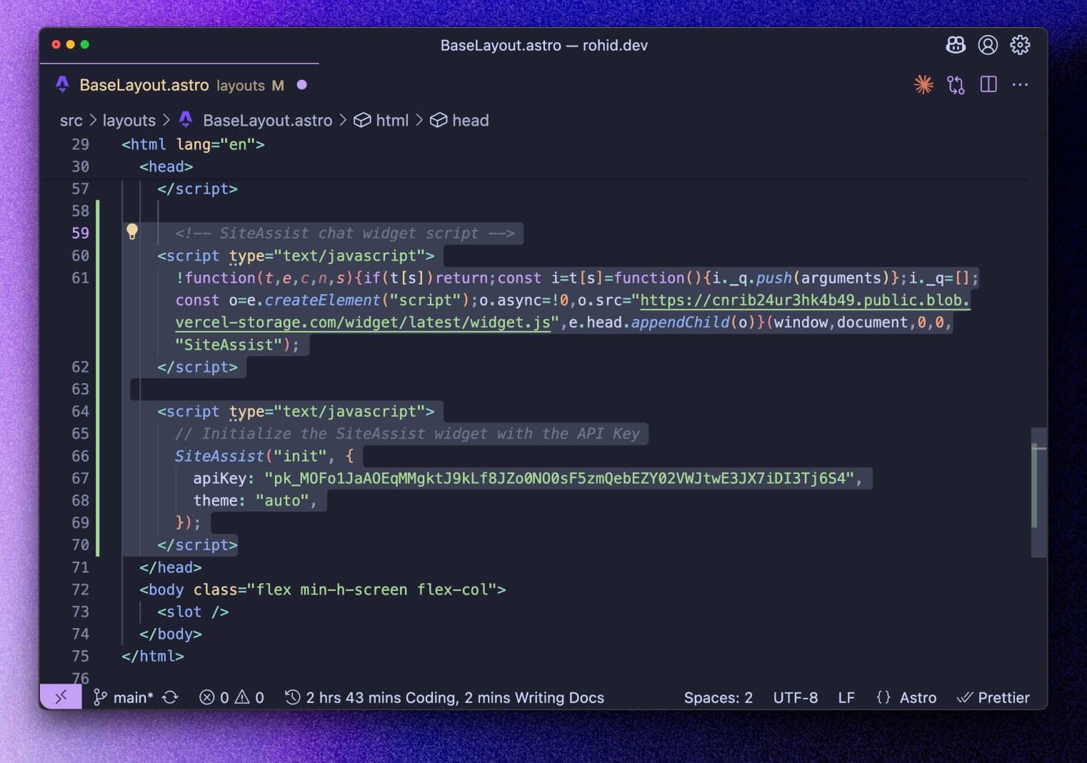 Screenshot showing HTML code editor with the SiteAssist script tag pasted in the head section